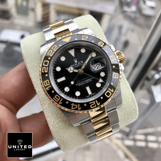 Rolex GMT-Master II 116713 dial is black with stick and dot indices Replica