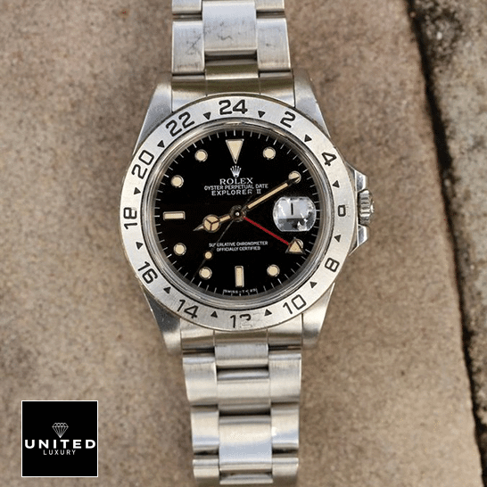 Rolex Explorer II 16570-0004 Stainless Steel Oyster Bracelet Replica on the table